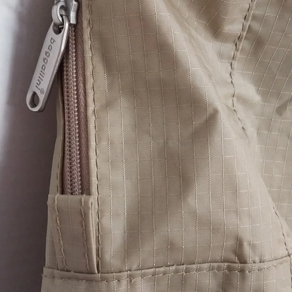 FOLDABLE Baggallini Tan Duffel Bag Spacious and Versatile